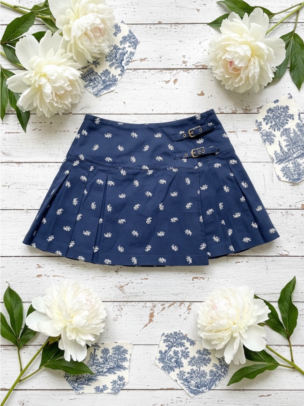 Hill House Navy Floral Pleated Midi Skirt with Buckle Detail
